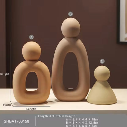 Estatua minimalista de la familia