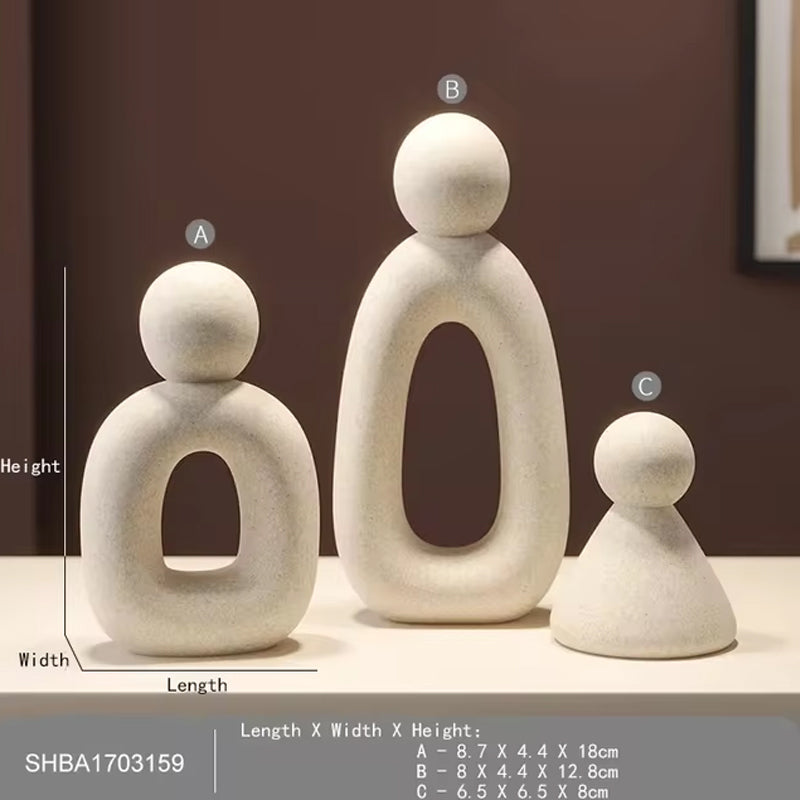 Estatua minimalista de la familia