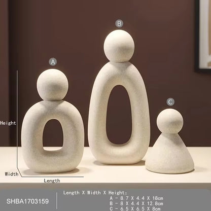 Estatua minimalista de la familia